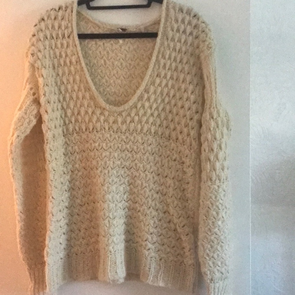 Free People loose weave sweater. Deep plunge v neck